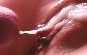 Slow motion cum between her labia close-up