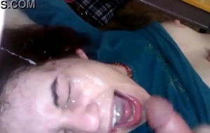 Girlfriend licks up the cum from a big facial