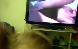 Mom gives son adherent while he watches porn