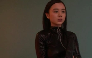 Costumed asian mom in catsuit facialized